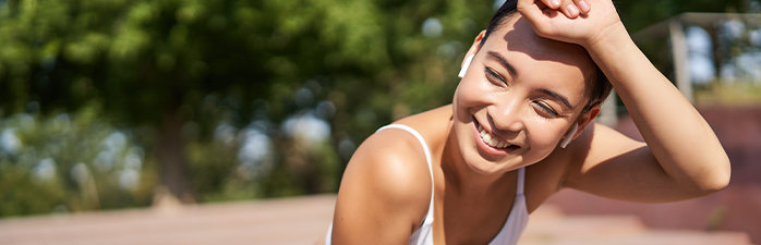 Woman catching her breath after exercising outside